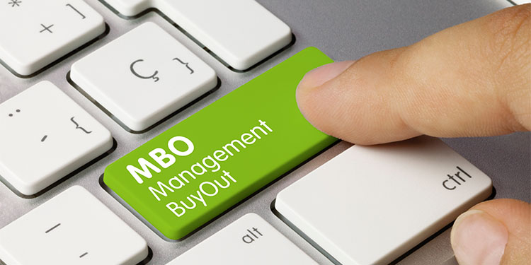A computer keyboard with the term, management buyout (MBO) highlighted on a key.