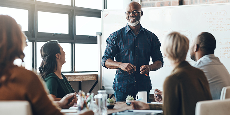 Employees in a conference room.