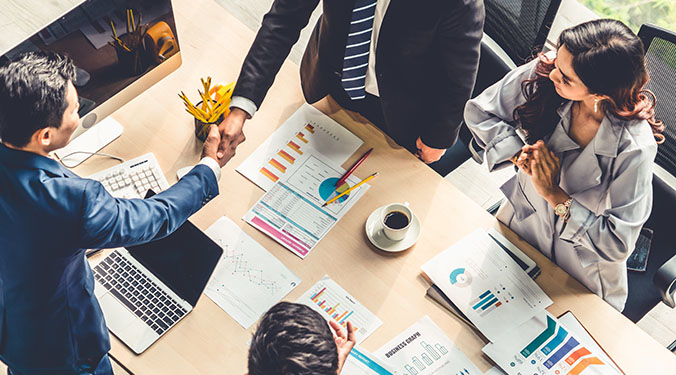 Business owners negotiating an asset sale.