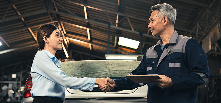 Small business owner assisting a client.