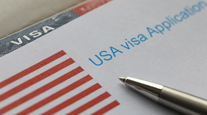 Application for visa for United States, representing the E-2 visa foreign investors use to be able to buy U.S. businesses. 
