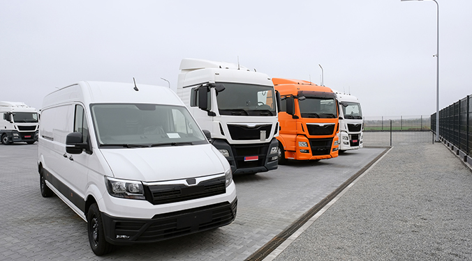 Fleet of trucks in a lot. 