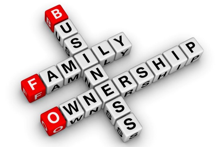 White and red boggle tiles that spell family business ownership