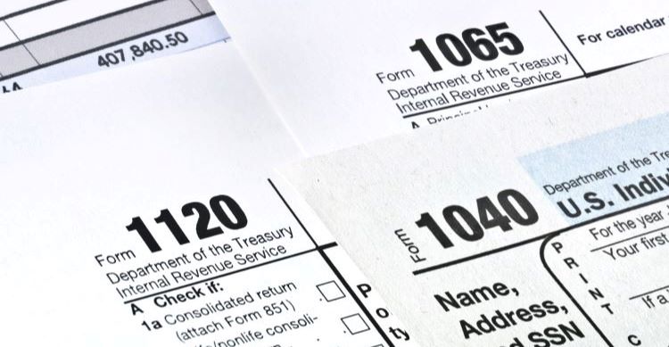 Tax forms including the 1120, 1065 and 1040 forms.
