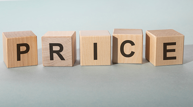 The word "price" spelled out in wooden blocks. 