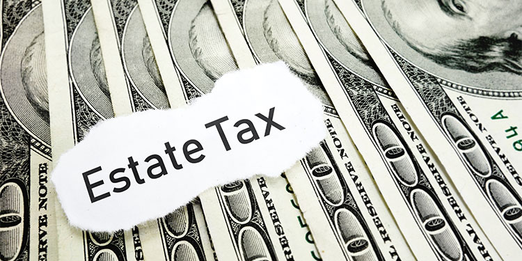 Cash background with the words "estate tax" highlighted. 
