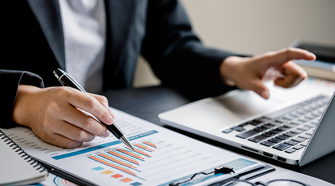 Valuation documents displayed on computer.