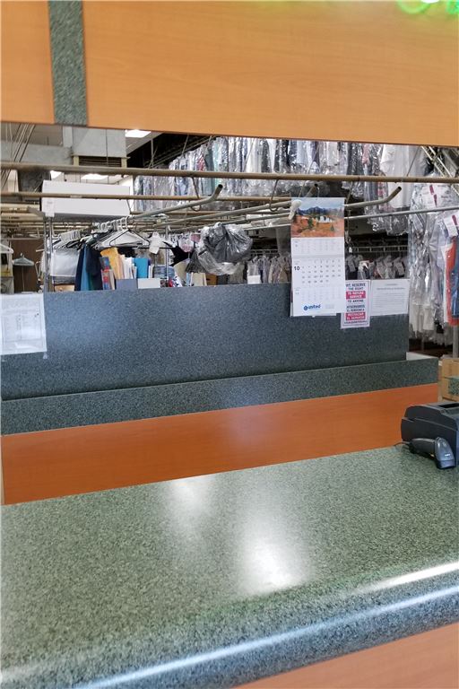 Dry Cleaning. Mall front of Theater in Riverside