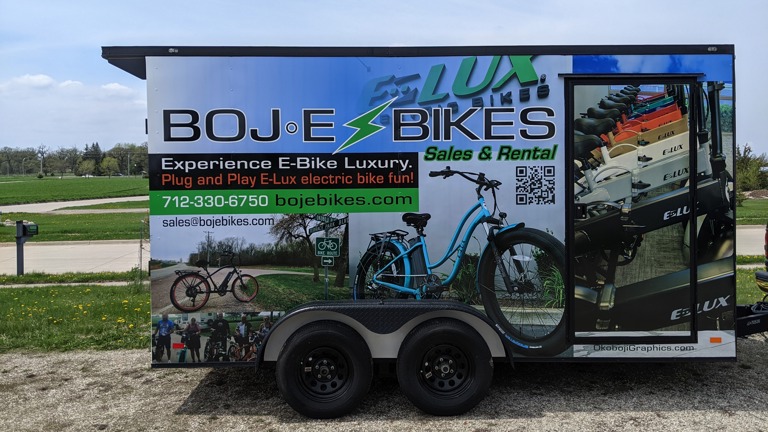 Design, print production wrap installation on retail trailer.