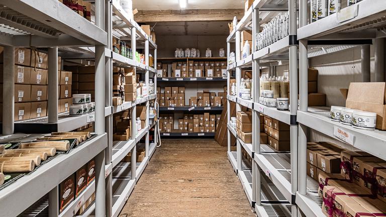 Organized inventory shelves keep Ola products stocked, labeled, and ready for fast pick-pack-ship fulfillment