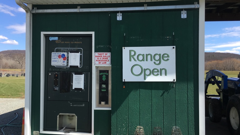 Driving range ball dispenser and token machine