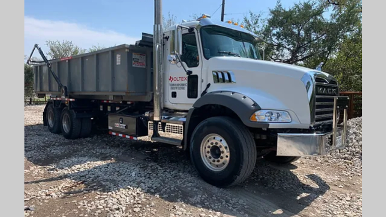 Mack Truck and 20 Yard Container