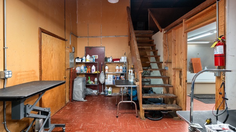 Extra grooming tables and storage upstairs