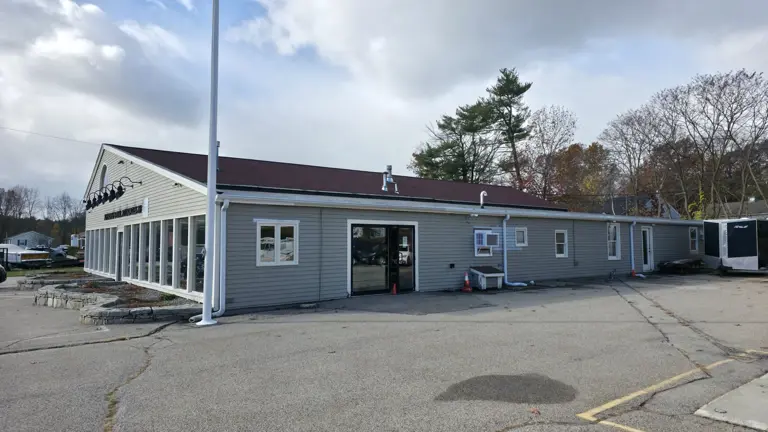 60± on-site parking spaces with approximately 225 feet of road frontage