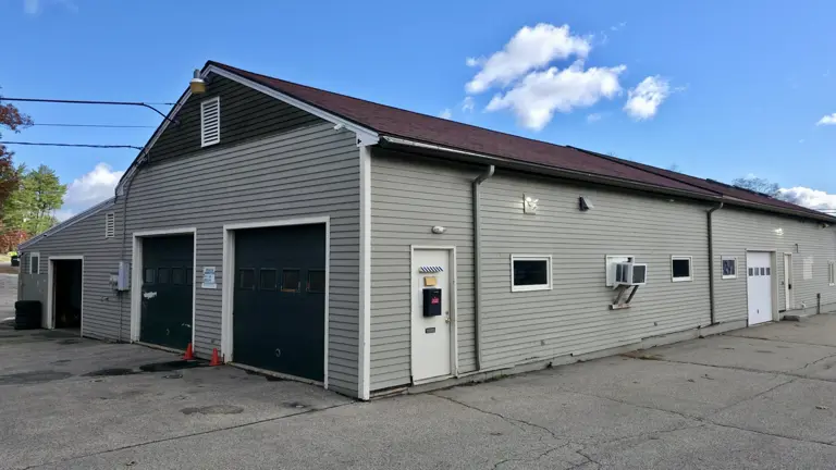 Multiple bays with entrances in the back and side of the building