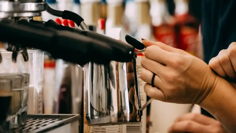 Profitable Specialty Coffee Roastery & Café Chain with Community Focus