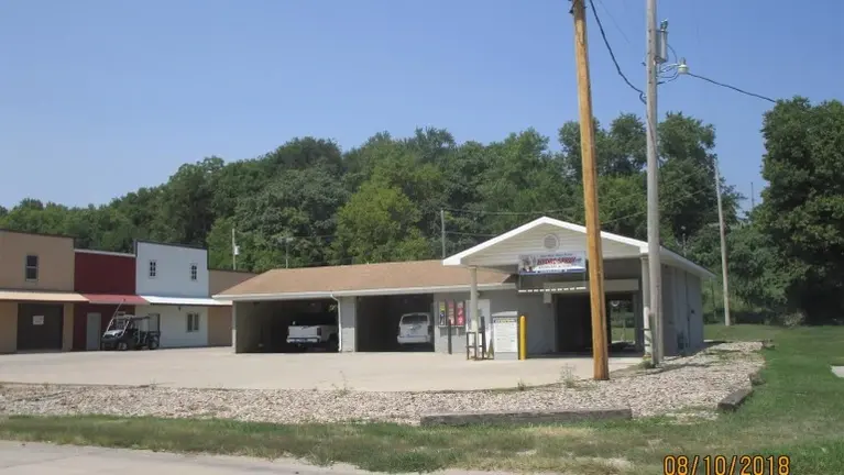 Profitable and Updated Car Wash AND 3000 SF Commercial bay for SALE!