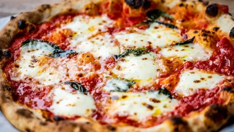 Newton Fast Casual specializing in pizza, sandwiches, and dinners to