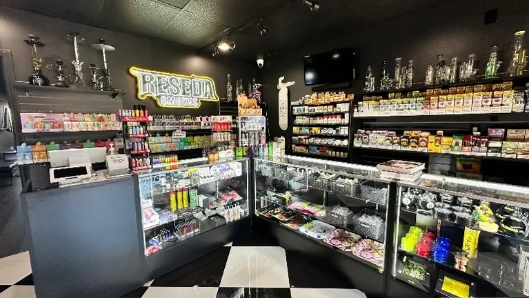 Smoke shop with speakeasy barbershop in Los Angeles, California - BizBuySell