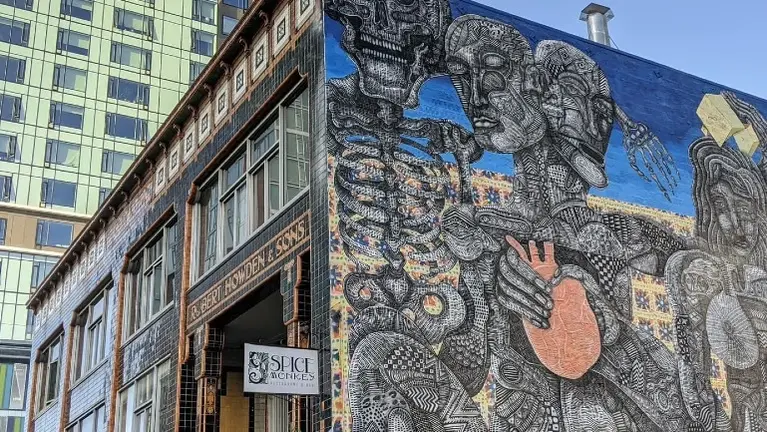 Side of the building it Sister Restaurant back in the day