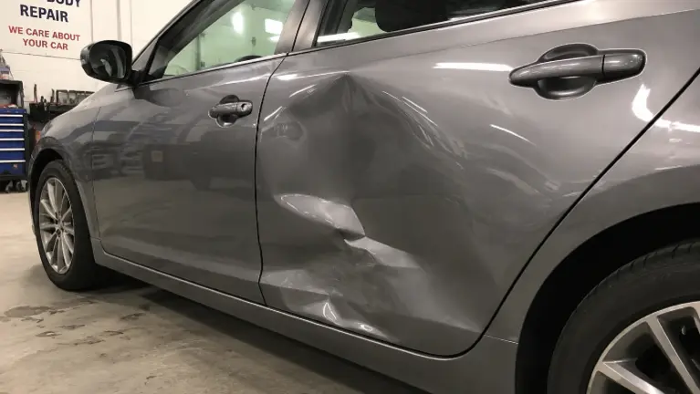 Well-Established Auto Body Shop And Real Estate